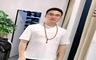 譚先生