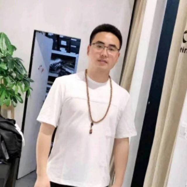 譚先生
