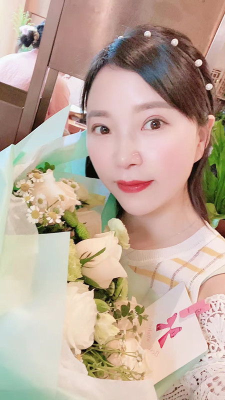 張女士