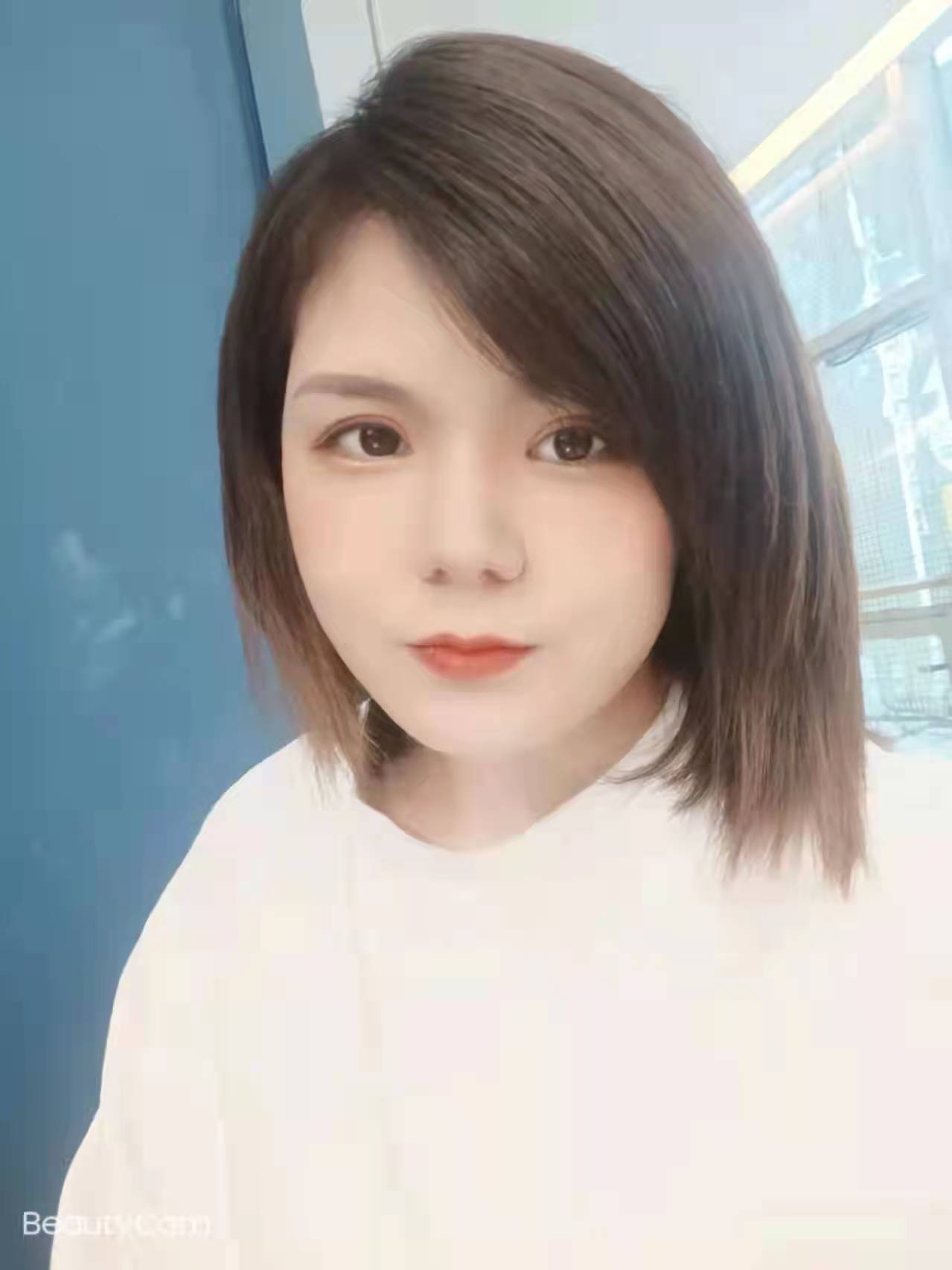 譚小姐
