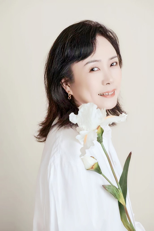 丁女士 